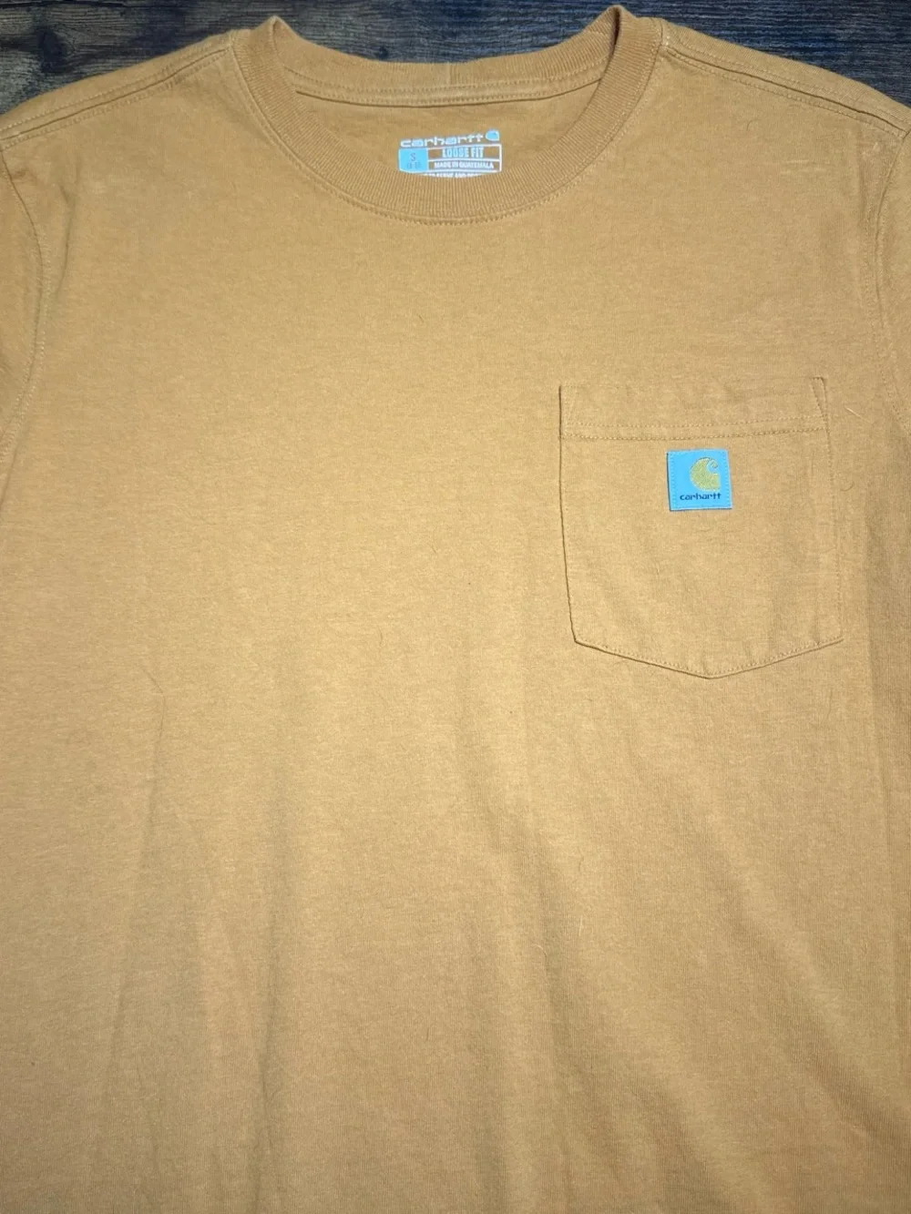Orange Carhartt pocket tee